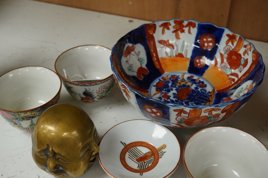 A Chinese Yixing teapot, a blue and white prunus jar, a Kutani tea bowl and two covers, other items, largest 15cm high